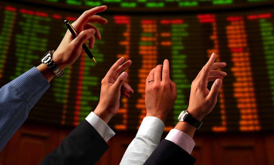 What is a Stock Exchange and what does trading stock mean?